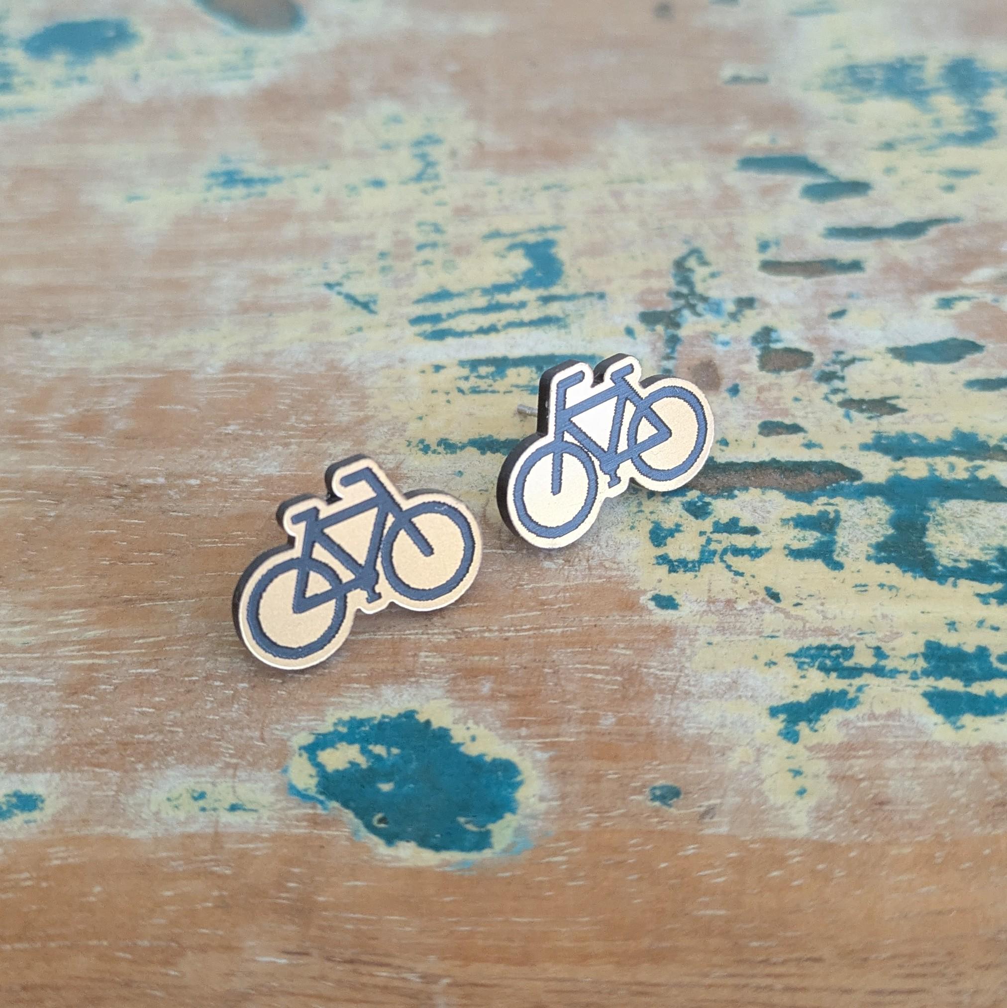 Push Bike Stud earrings in gold and black